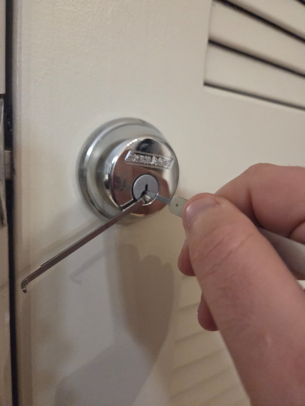 Opening a locked front door deadbolt