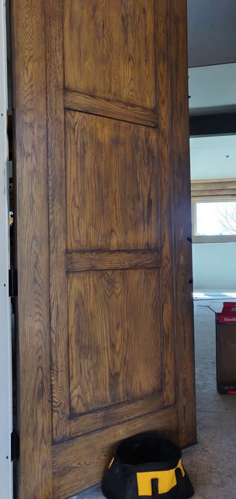 New deadbolt installed on a wooden front door